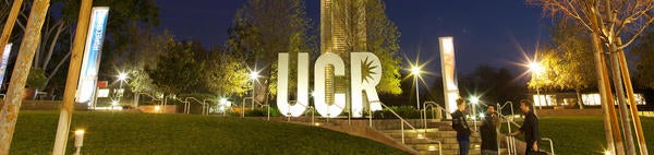 UCR campus with bell tower at night
